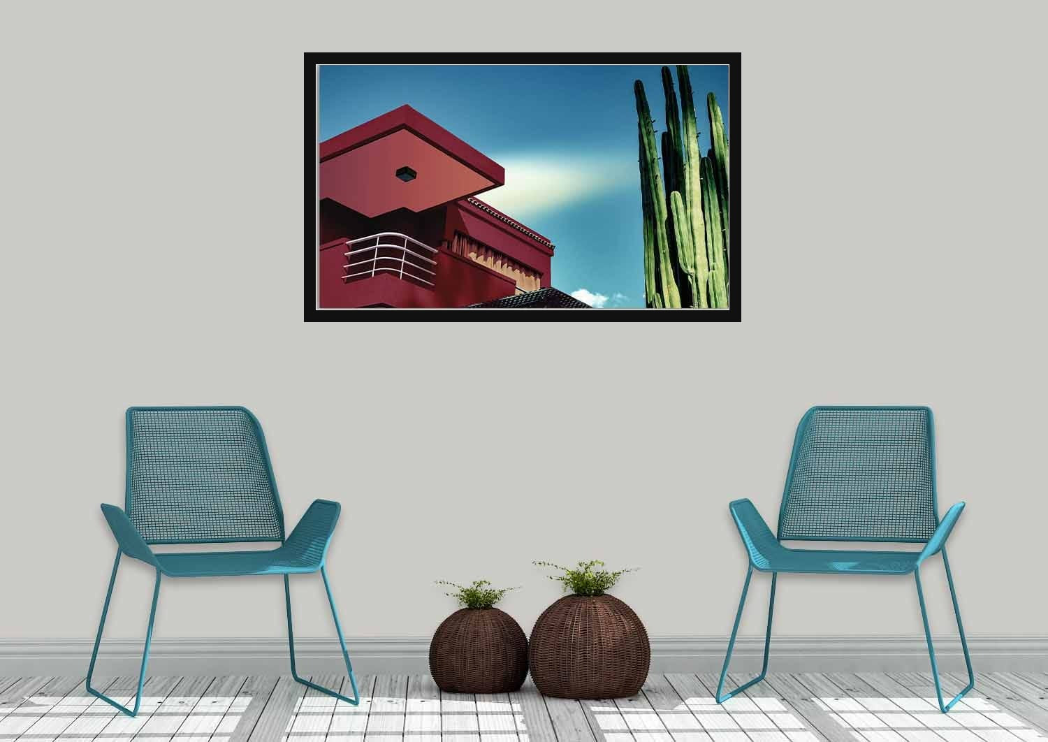 Warme woonkamer met een ingelijst mediterraan architectuurschilderij in terracotta-aardetinten uit de Wandkraft-collectie, voor een stijlvol interieur