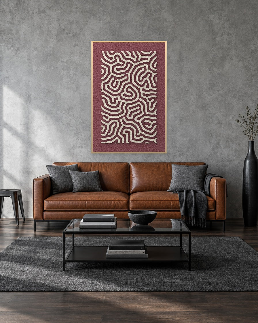 Coral Maze Red viltpaneel met blanke baklijst aan de wand in een industriële loft