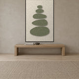 Pebble Cairn Sage viltpaneel aan de wand in een Scandinavisch interieur